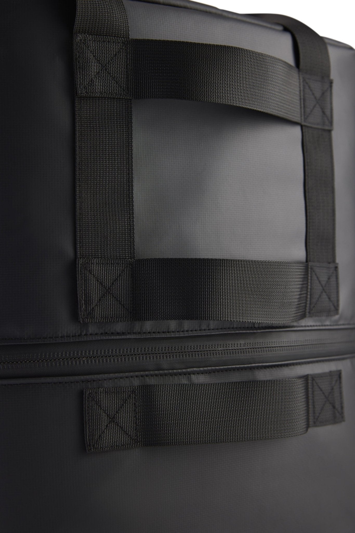 Close-up of the side handles on the GottaGo carry bag
